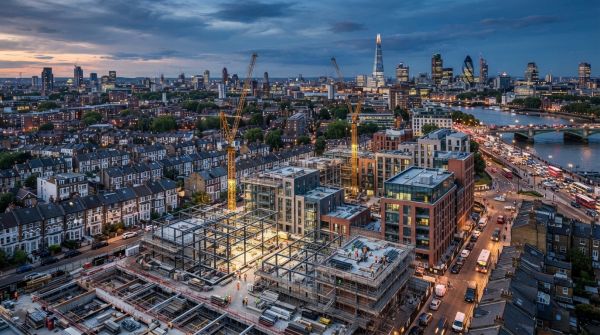 How is urbanization influencing housing developments in the UK?